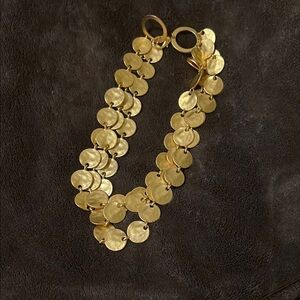 Elegant Gold Disc Bracelet